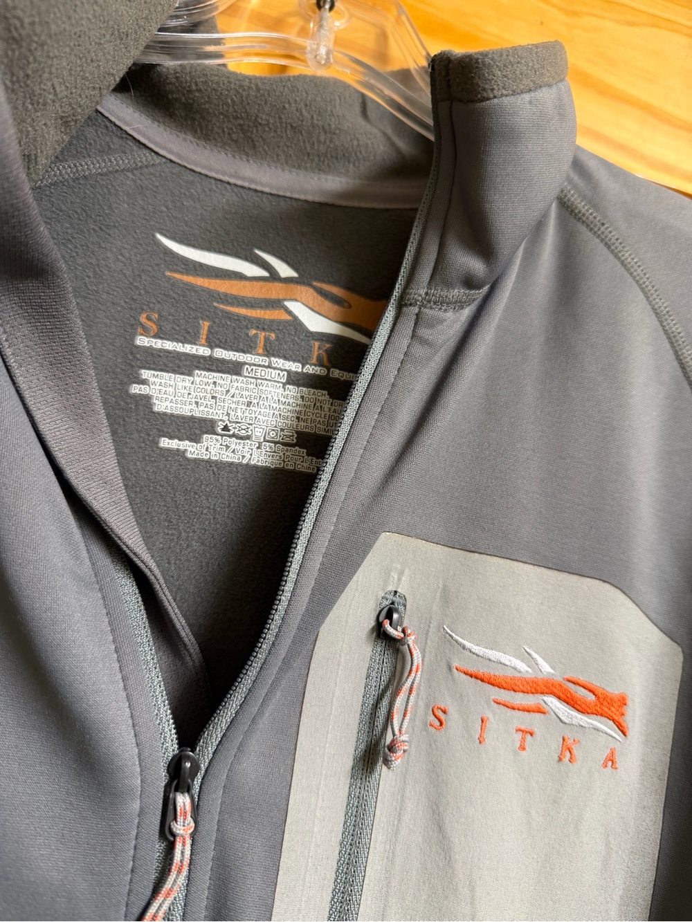 Sitka Gray Softshell sweatshirt with Orange Logo